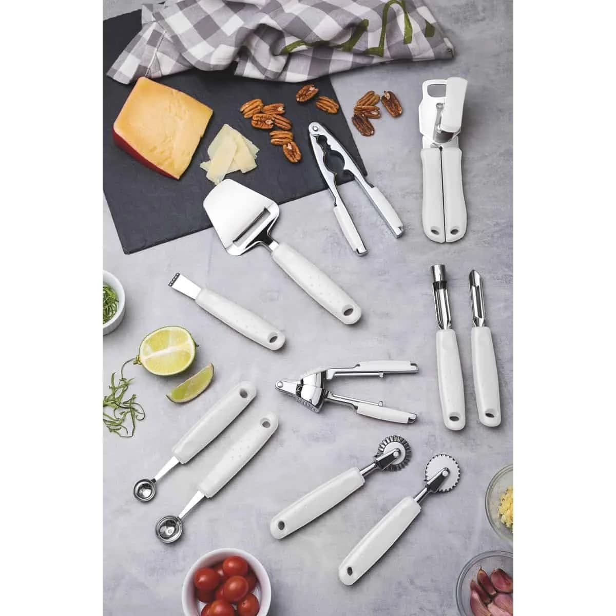 Rallador de limón Tramontina Utilità de acero inoxidable 15.3 cm con mango blanco — imagen 2 de 3