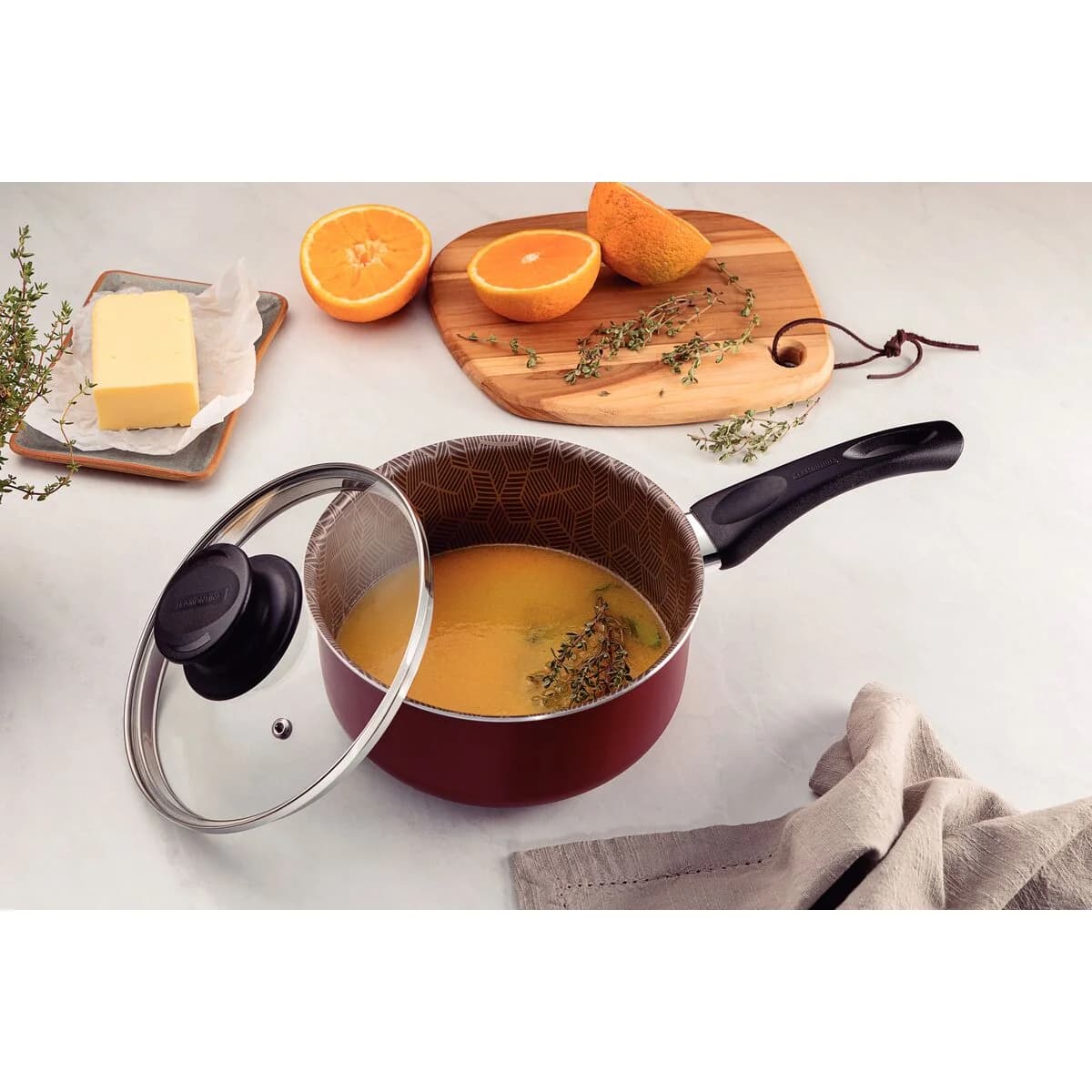 Olla antiadherente con tapa de vidrio Tramontina Paris 16 cm 1.5 L roja — imagen 6 de 6