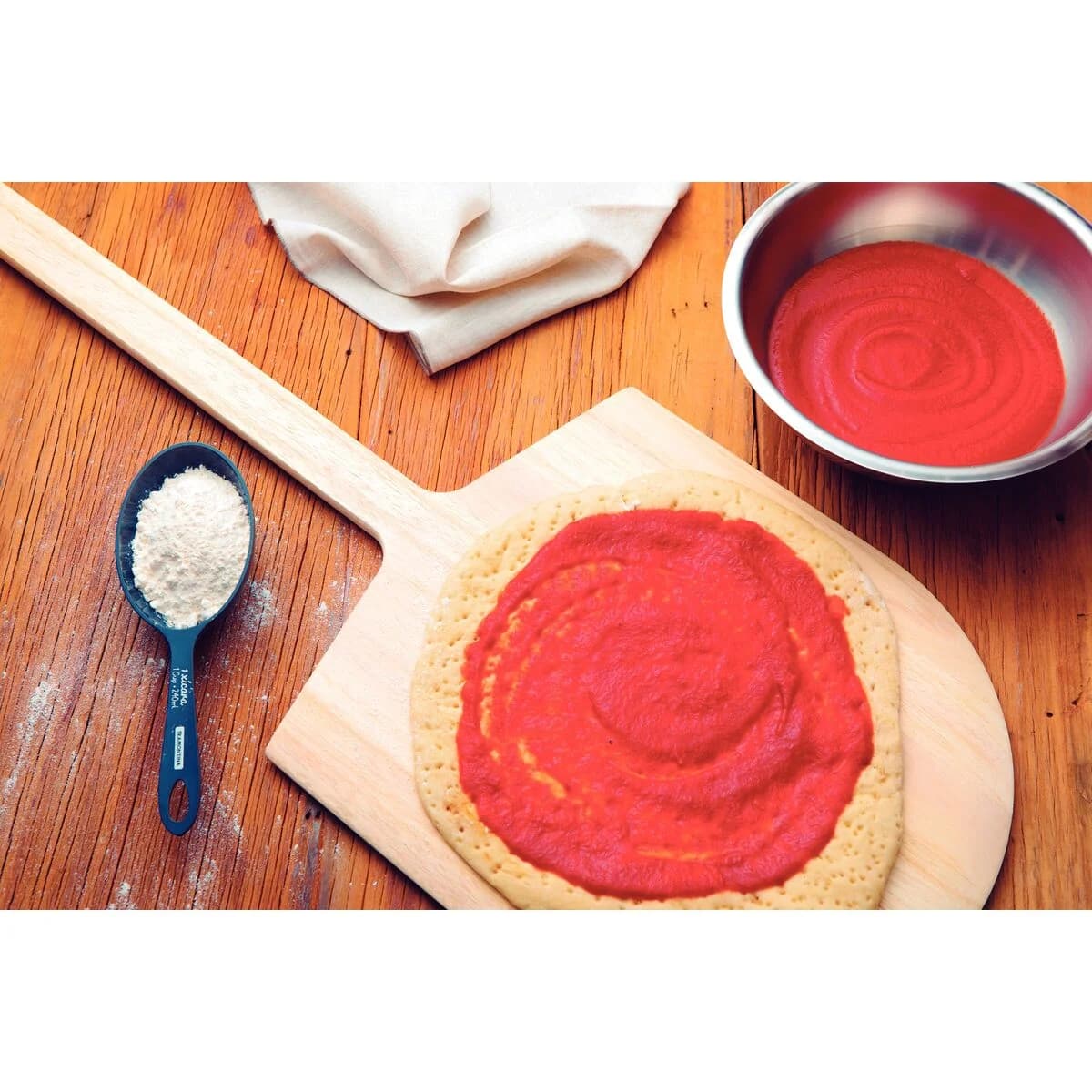 Pala para pizza de madera con mango largo Tramontina Utilínea 91.4 x 35.5 cm — imagen 3 de 3