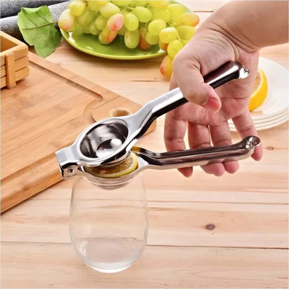 Exprimidor Manual De Lima Limon Citricos Acero Inoxidable — imagen 2 de 2