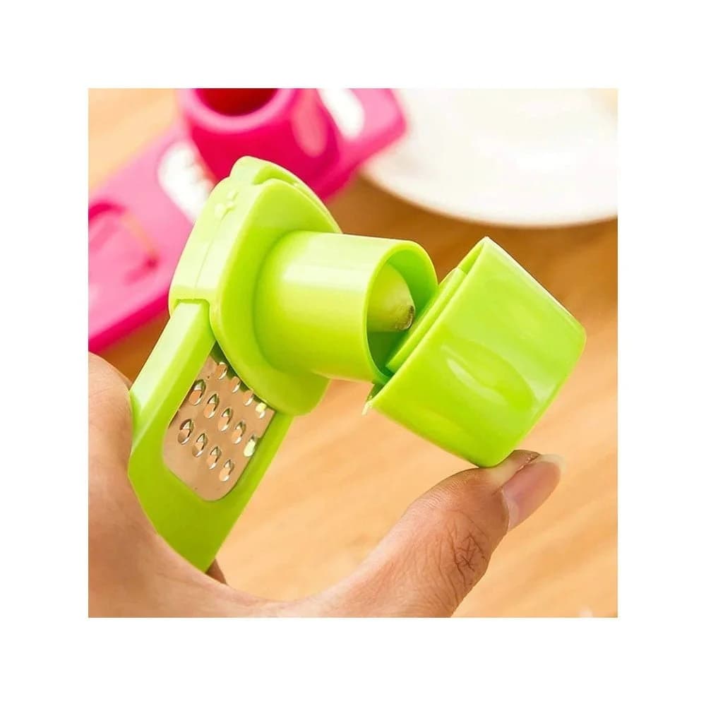 Rallador De Ajo Plastico Ojas De Acero Inox 14 Cm Grupo Dos — imagen 4 de 4
